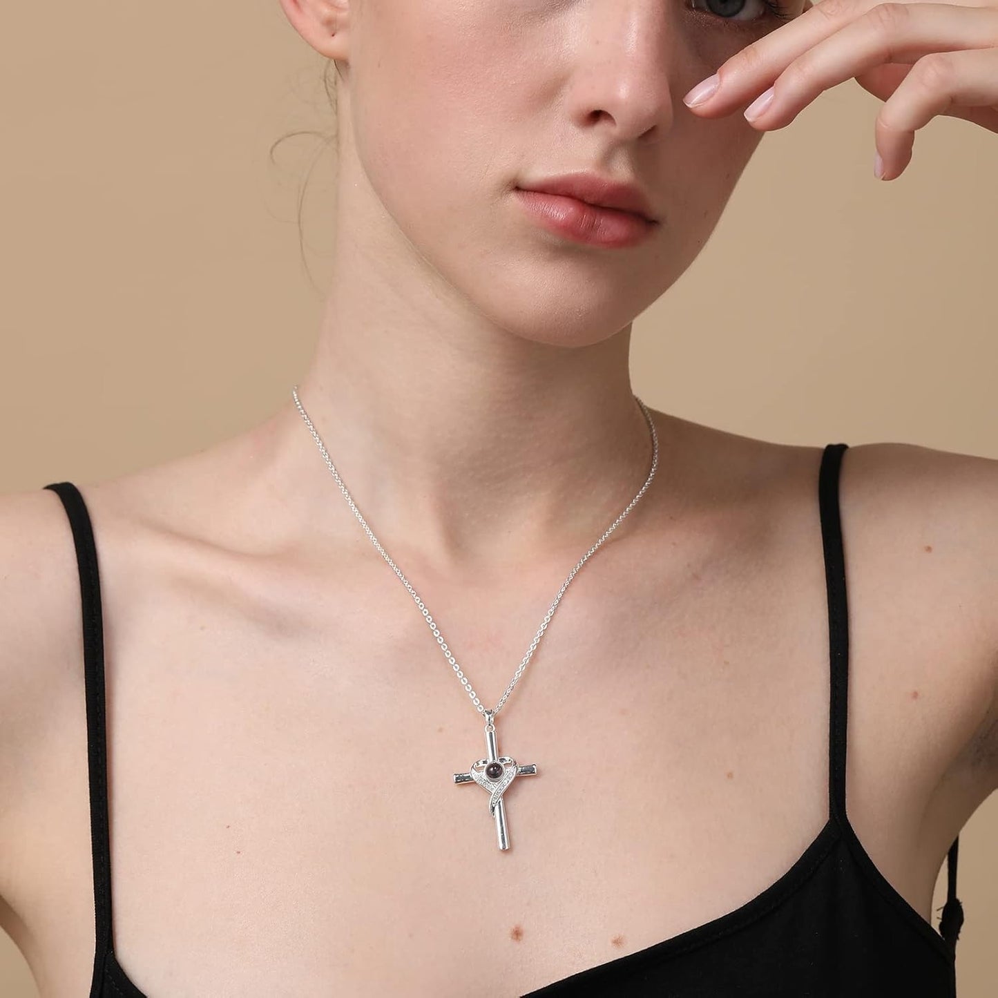 Unique Necklace with Cross and Bible Verse Visible Through a Lens