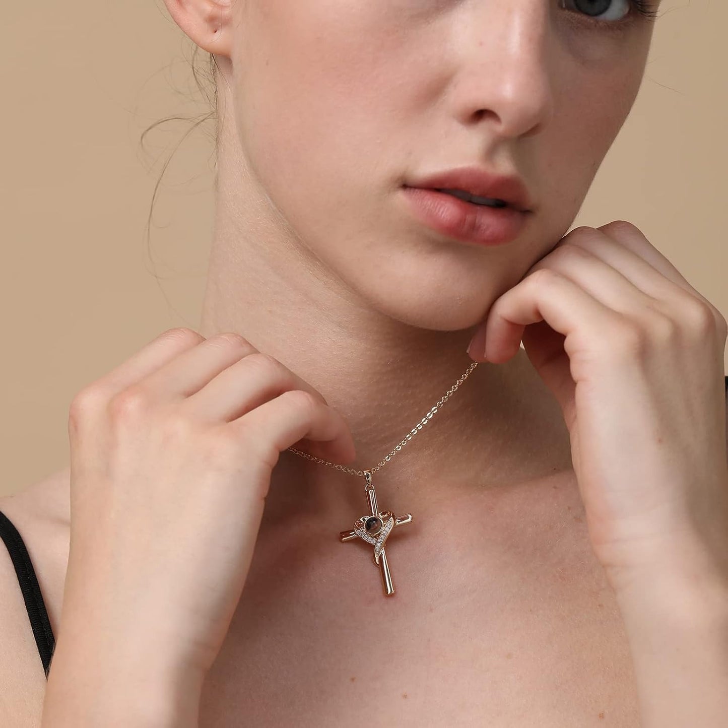 Unique Necklace with Cross and Bible Verse Visible Through a Lens