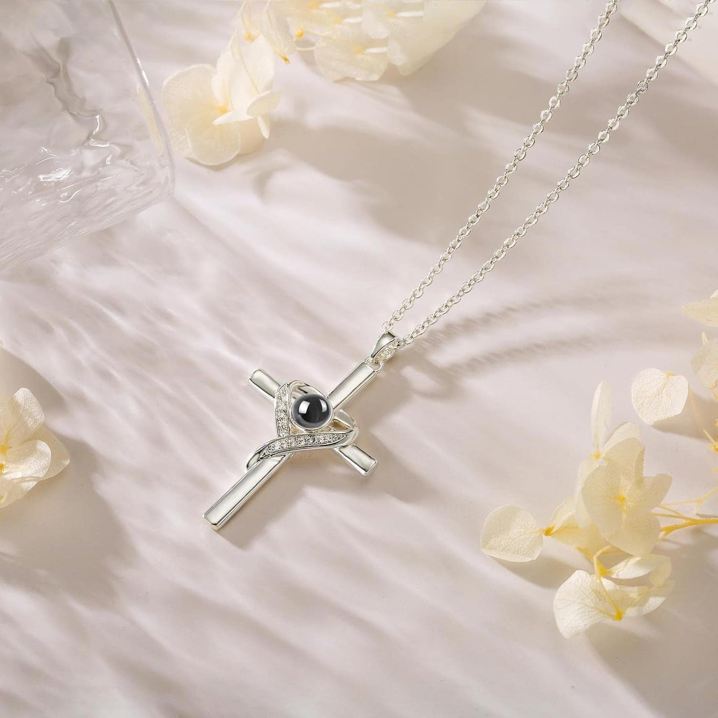 Unique Necklace with Cross and Bible Verse Visible Through a Lens