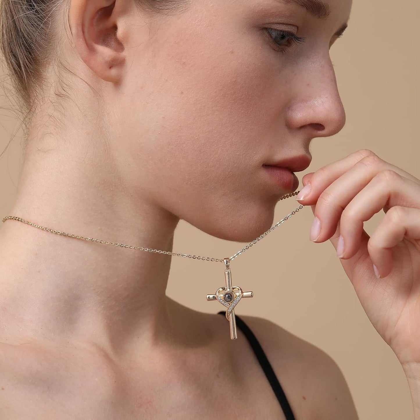 Unique Necklace with Cross and Bible Verse Visible Through a Lens