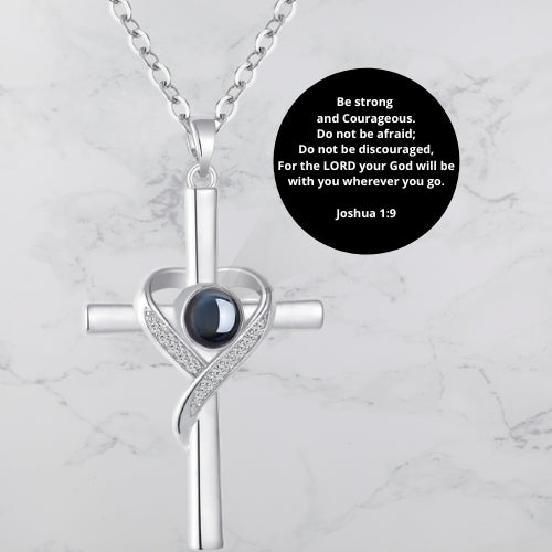 Unique Necklace with Cross and Bible Verse Visible Through a Lens