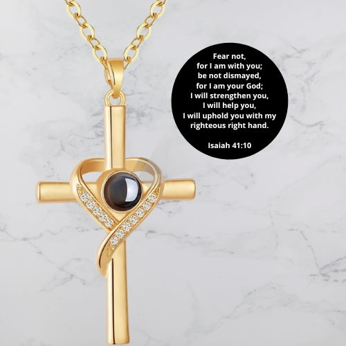 Unique Necklace with Cross and Bible Verse Visible Through a Lens