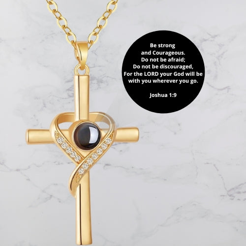 Unique Necklace with Cross and Bible Verse Visible Through a Lens